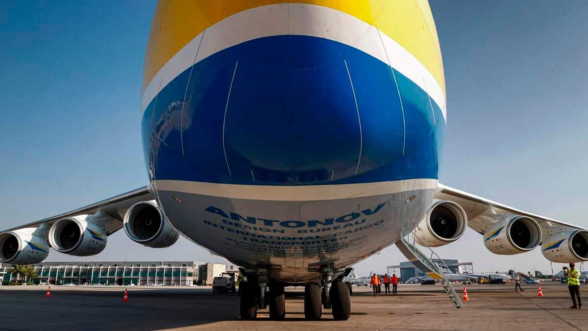 This picture taken on August 3, 2020 shows a view of the Antonov An-225 Mriya strategic airlift cargo aircraft, the world's largest cargo plane, upon landing at Israel's Ben Gurion International Airport in Lod, east of Tel Aviv. - The aircraft arrived in Israel carrying US Oshkosh military vehicles, which will be fitted to be used Iron Dome systems purchased by the US military, as per an August 2019 agreement. (Photo by JACK GUEZ / AFP)
