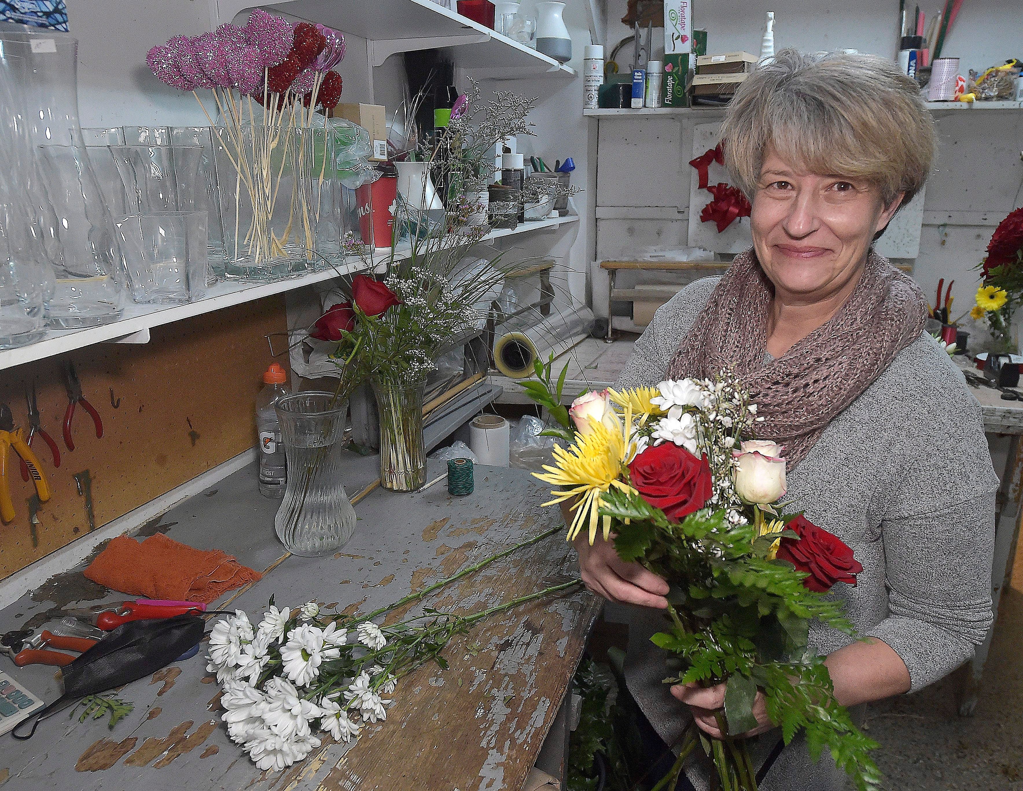Caroline Lachance, copropriétaire de Fleuriste Orchidée, sur la rue Cartier, connaît une grosse affluence aussi.