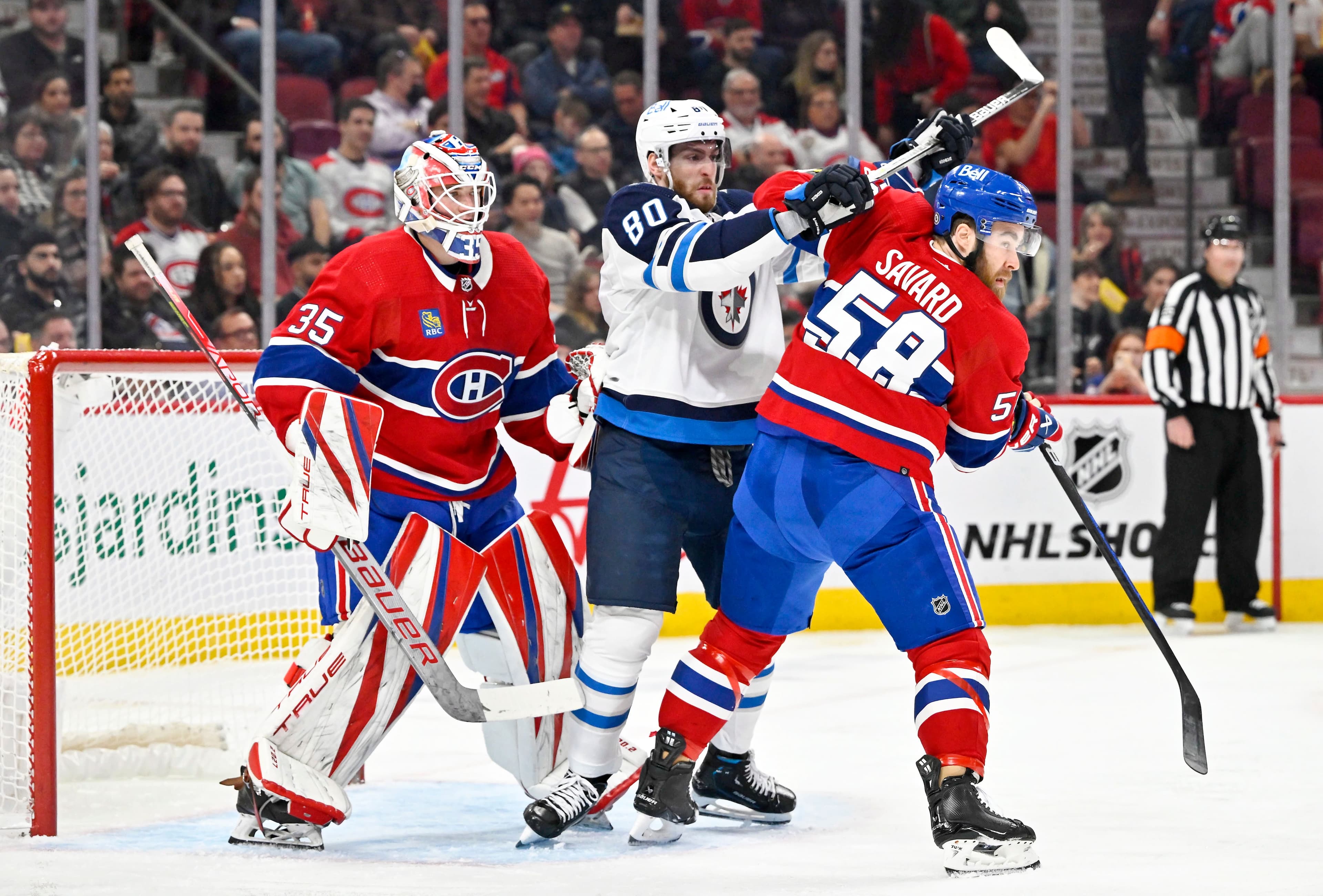 Pierre-Luc Dubois et David Savard n’y sont pas allés de main morte devant le filet de Samuel Montembeault au deuxième tiers.