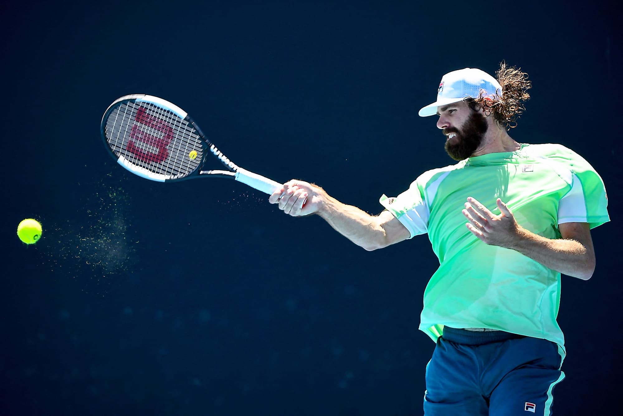 L’Américain Reilly Opelka, retournant ici un service de Dominik Koepfer, mercredi à Melbourne, sera le prochain rival de Denis Shapovalov.